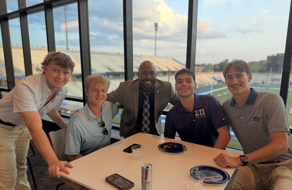 Photo of IFC members with Dean of Students